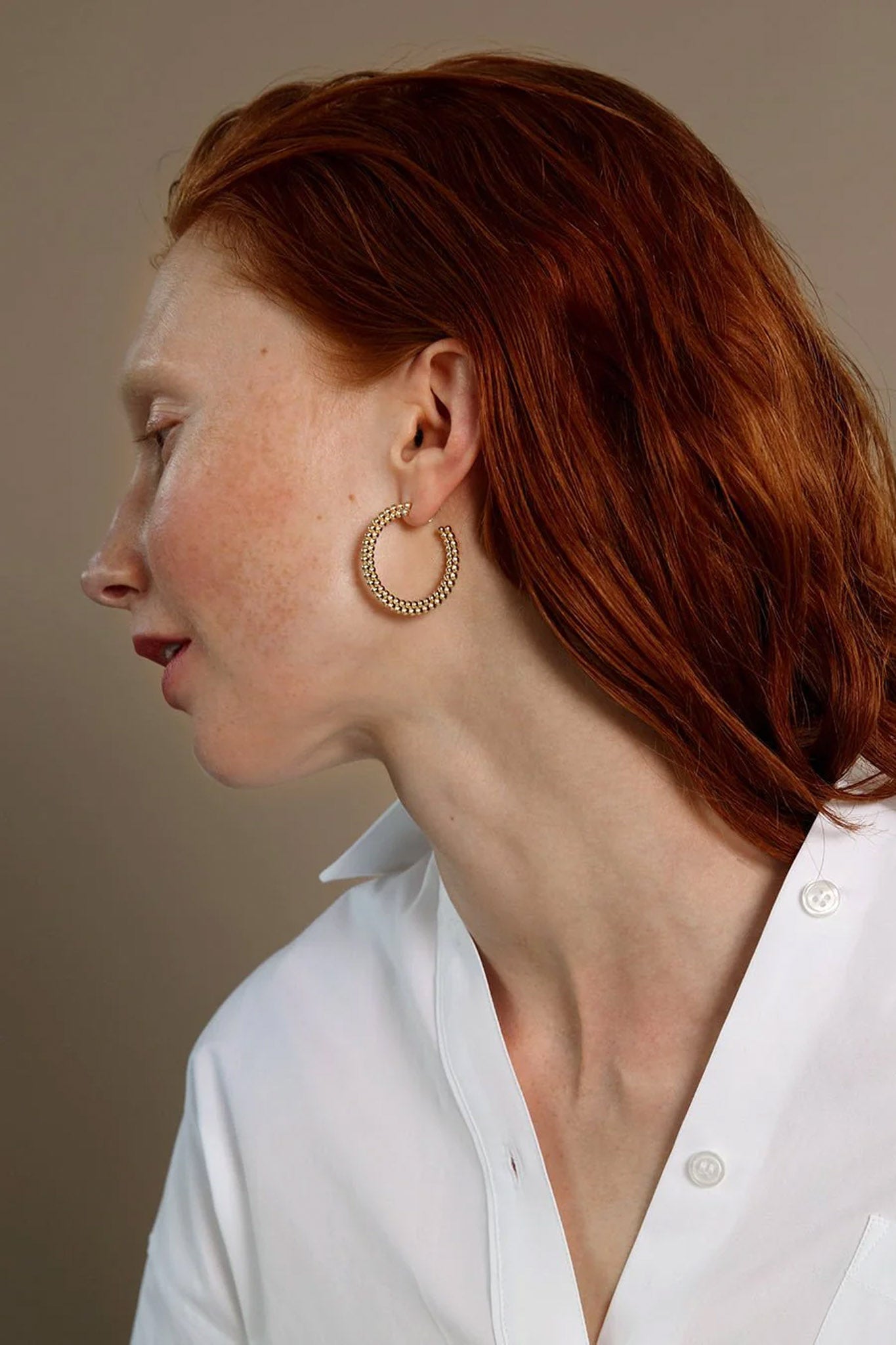 Kalevala Valoisa isot pronssiset korvakorut