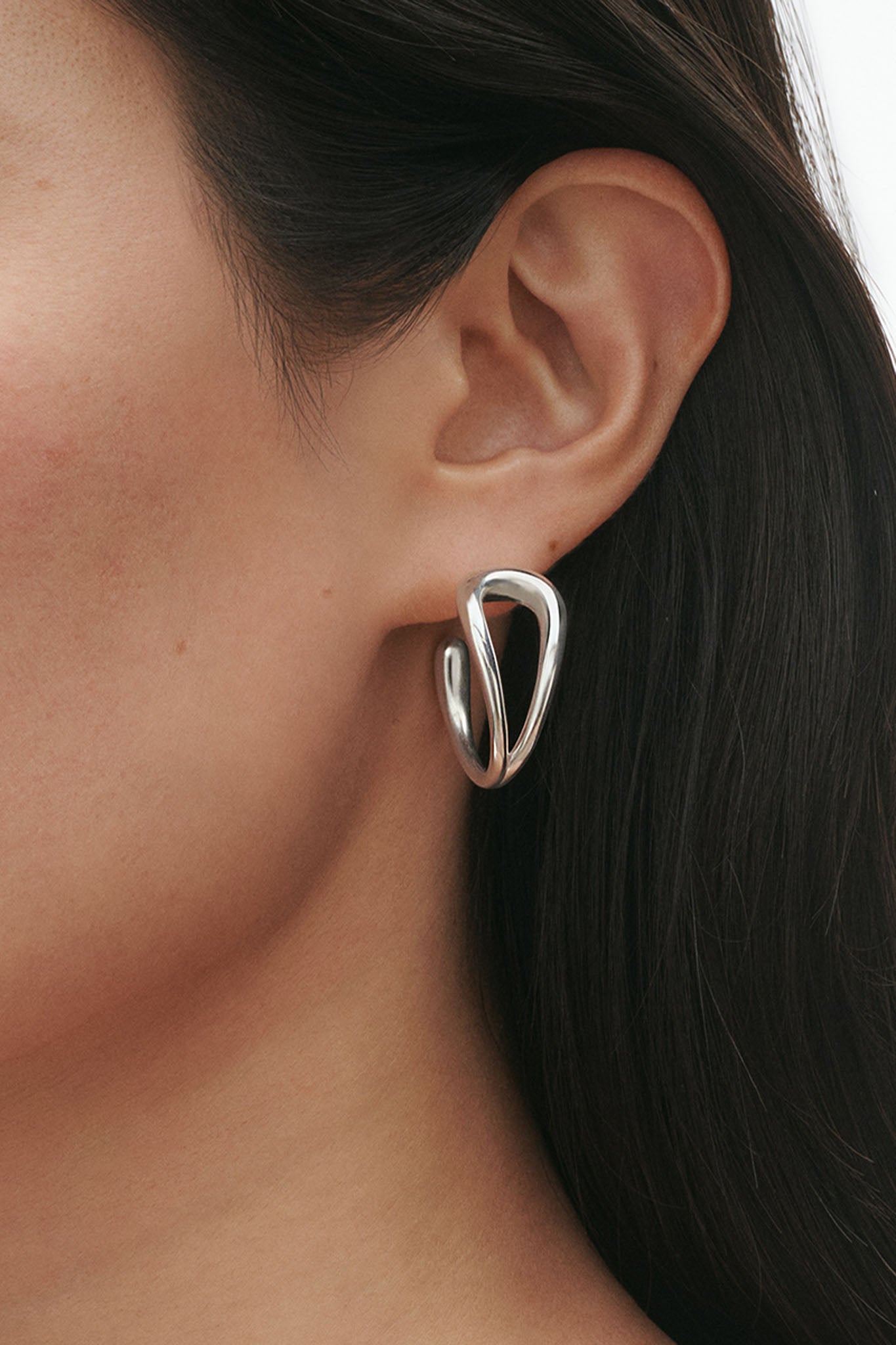 Georg Jensen Mercy Swirl hopeiset korvakorut