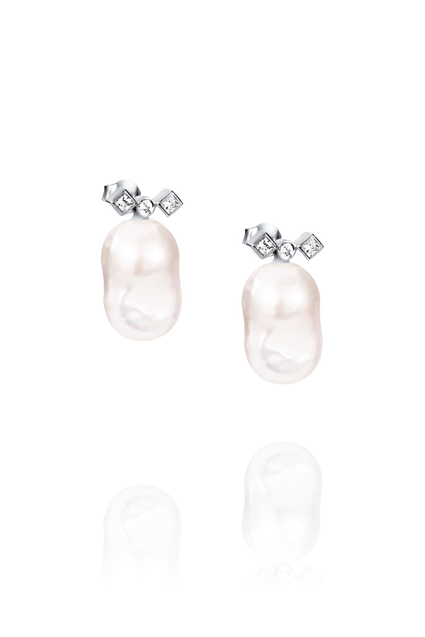 Efva Attling Twinkle & Unique Ear valkokultaiset korvakorut